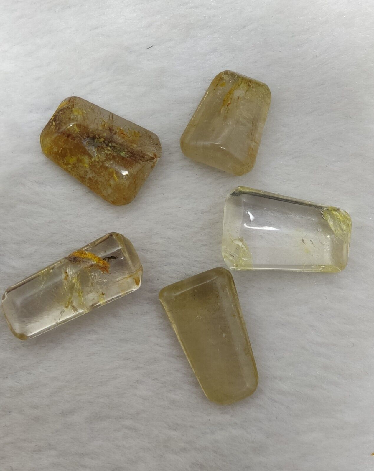 An amazing lot of Rutilated polished quartz tumbles 45 grams