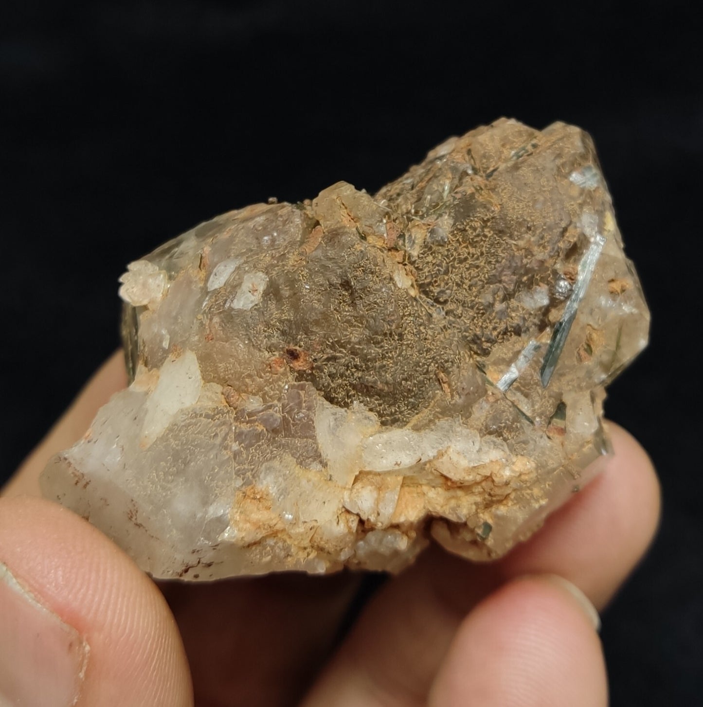 An Aesthetic terminated Quartz floater with aegirine inclusions 98 grams