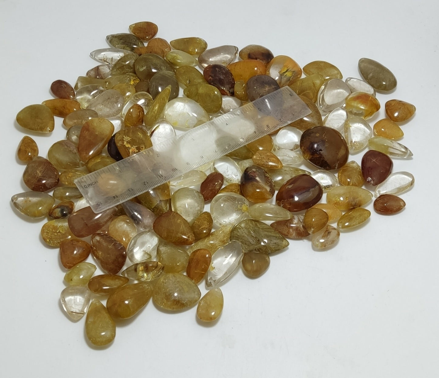 780 grams Rutilated polished quartz tumbles-cabochons