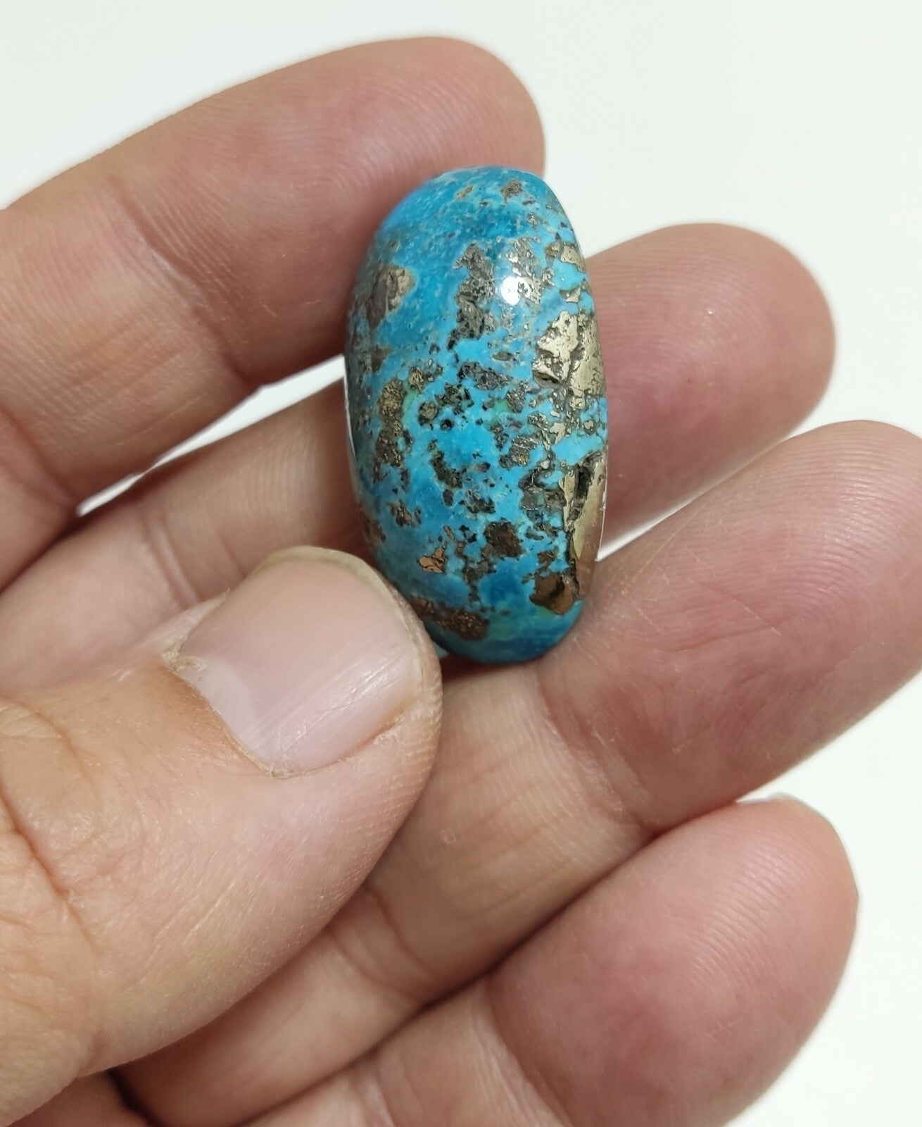 Two turquoise cabochons 22.5 grams both