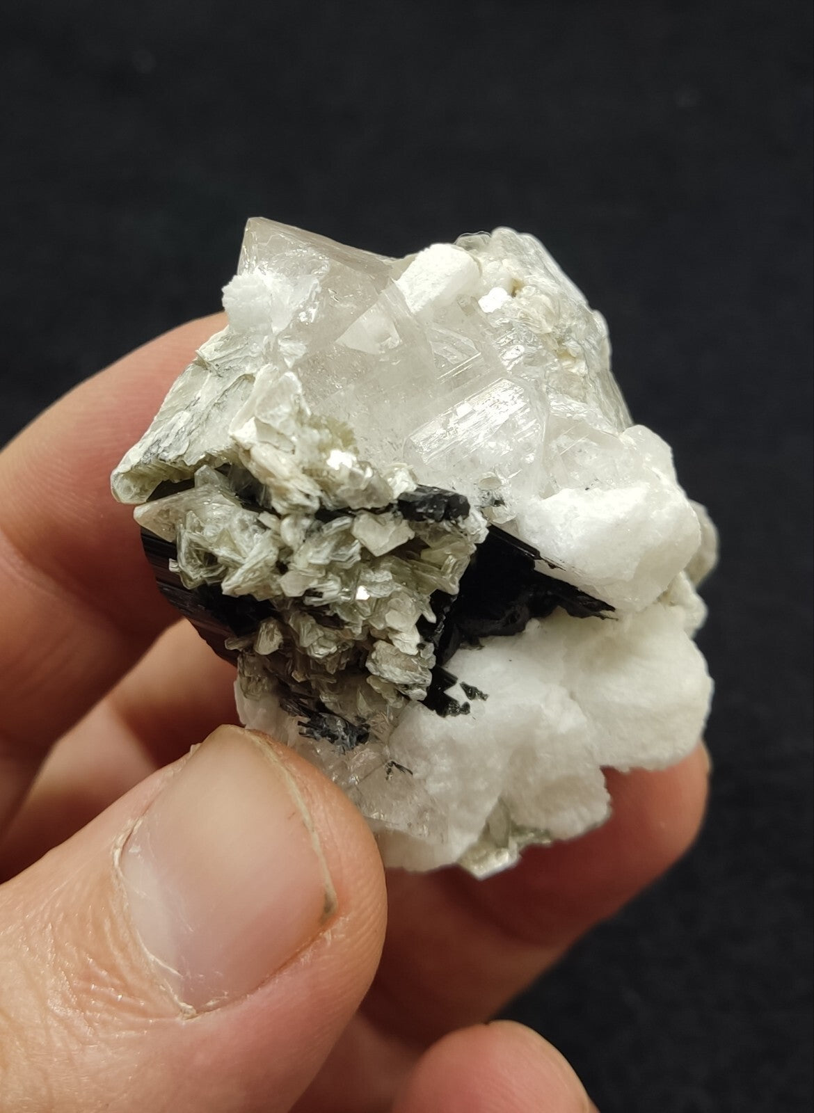 An Aesthetic specimen of muscovite with quartz, Tourmaline and albite 49 grams