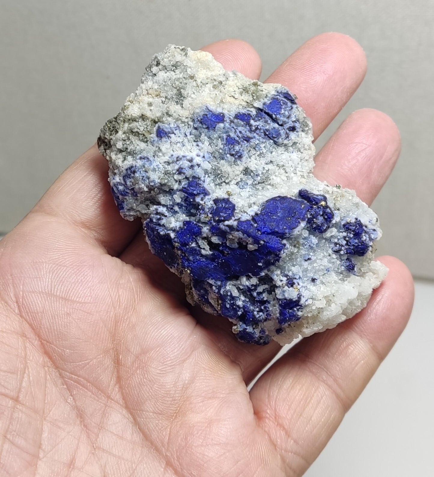 An Aesthetic specimen of fluorescent Lazurite with pyrite 112 grams