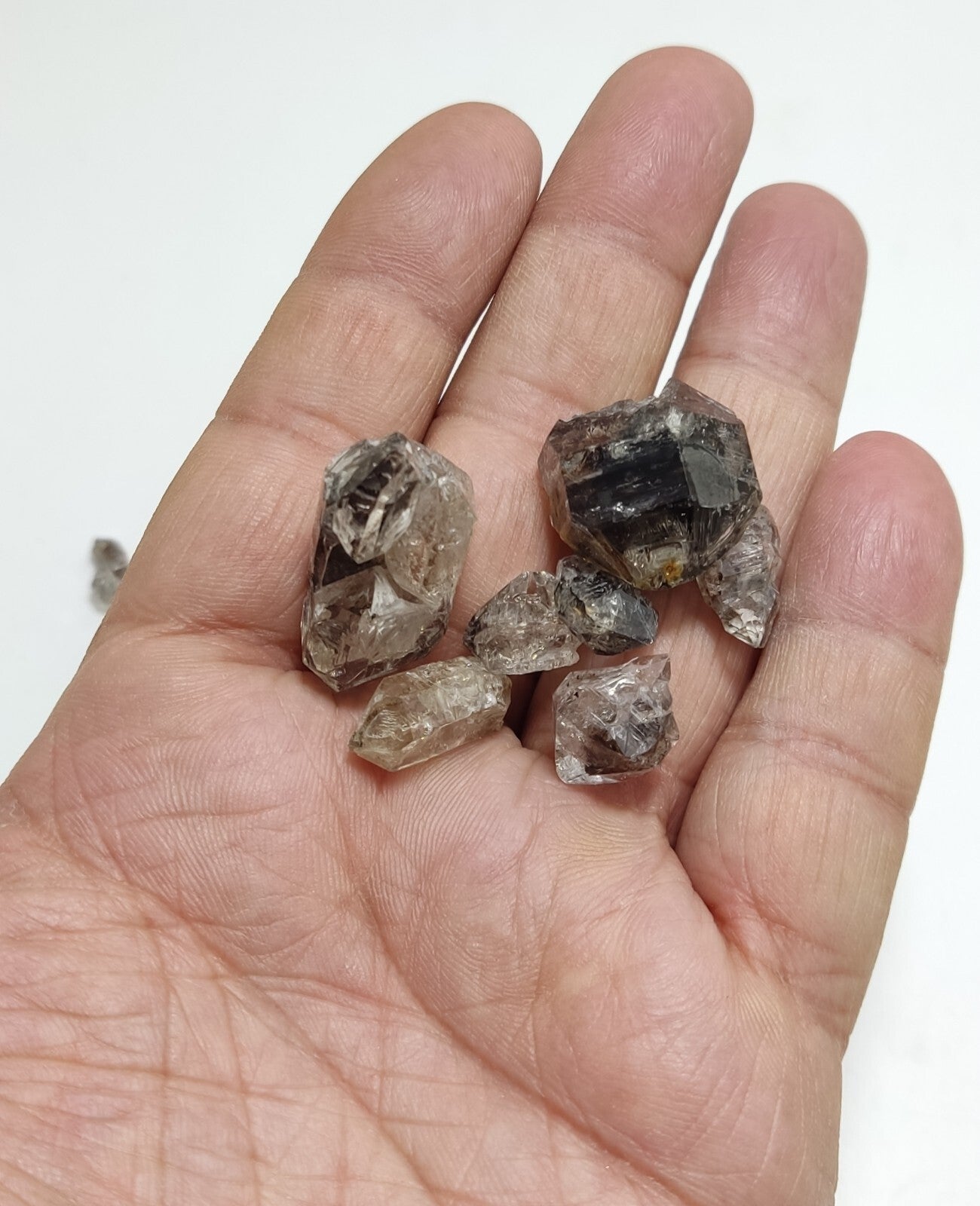 105 grams carbon included quartz crystals