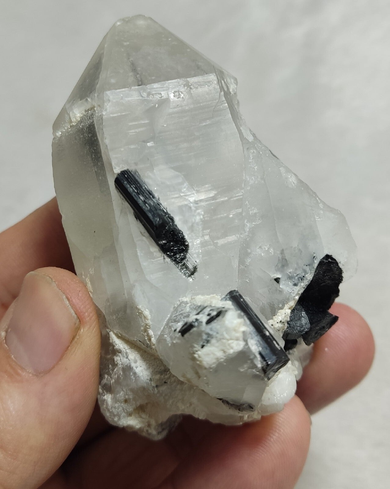 Natural quartz crystal with black tourmaline 145 grams