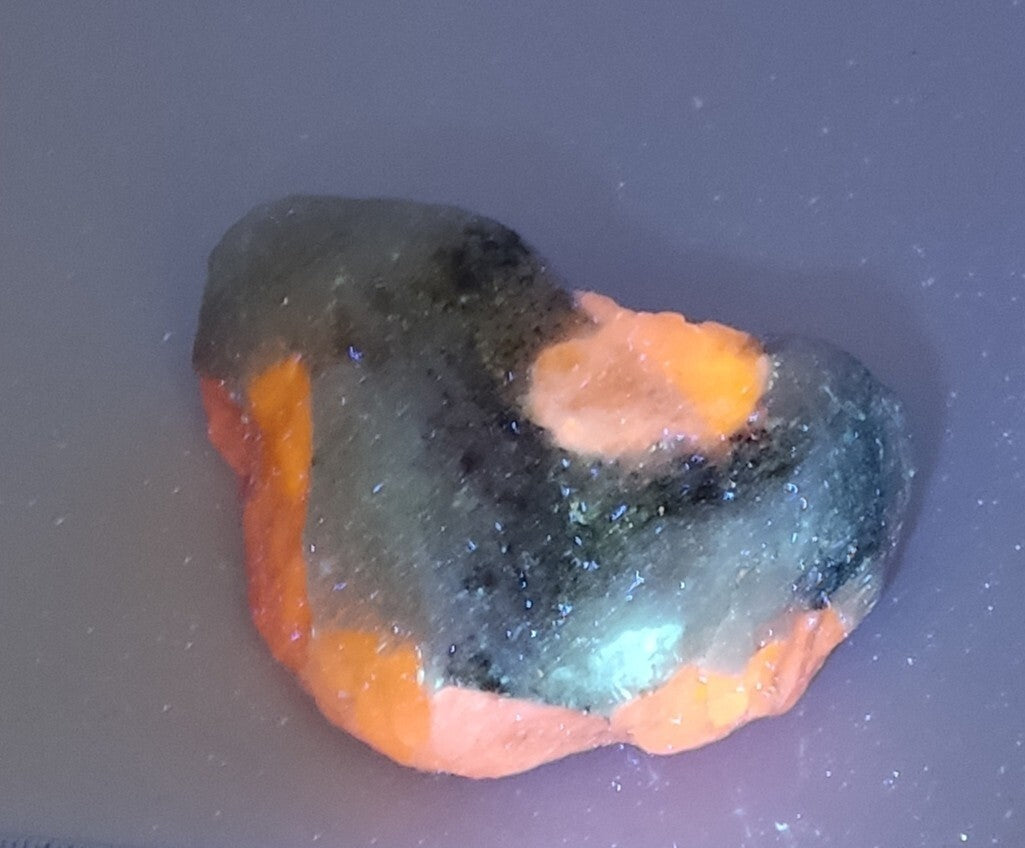 An amazing specimen of hackmanite highly Tenebrescent 124 grams