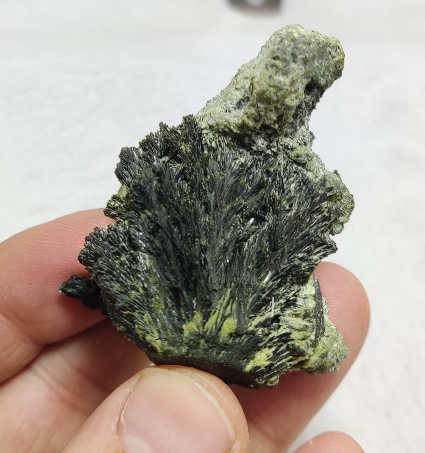 An aesthetic specimen of epidote crystal spray type 66 grams