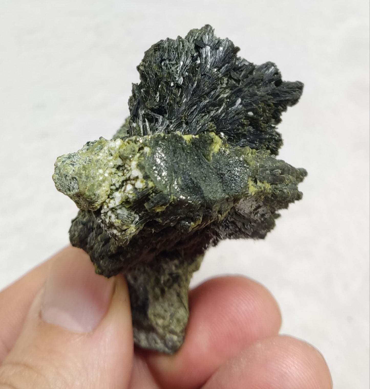 An aesthetic specimen of epidote crystal spray type 66 grams