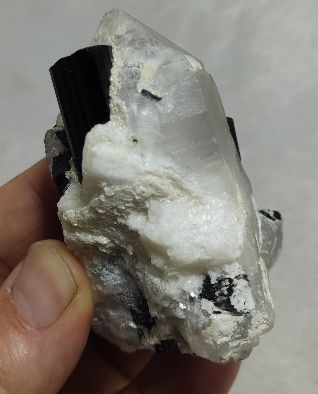 Natural quartz crystal with black tourmaline 145 grams