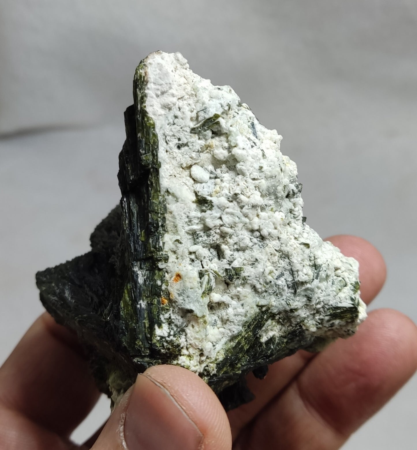 An aesthetic specimen of epidote crystal spray type on matrix 182 grams