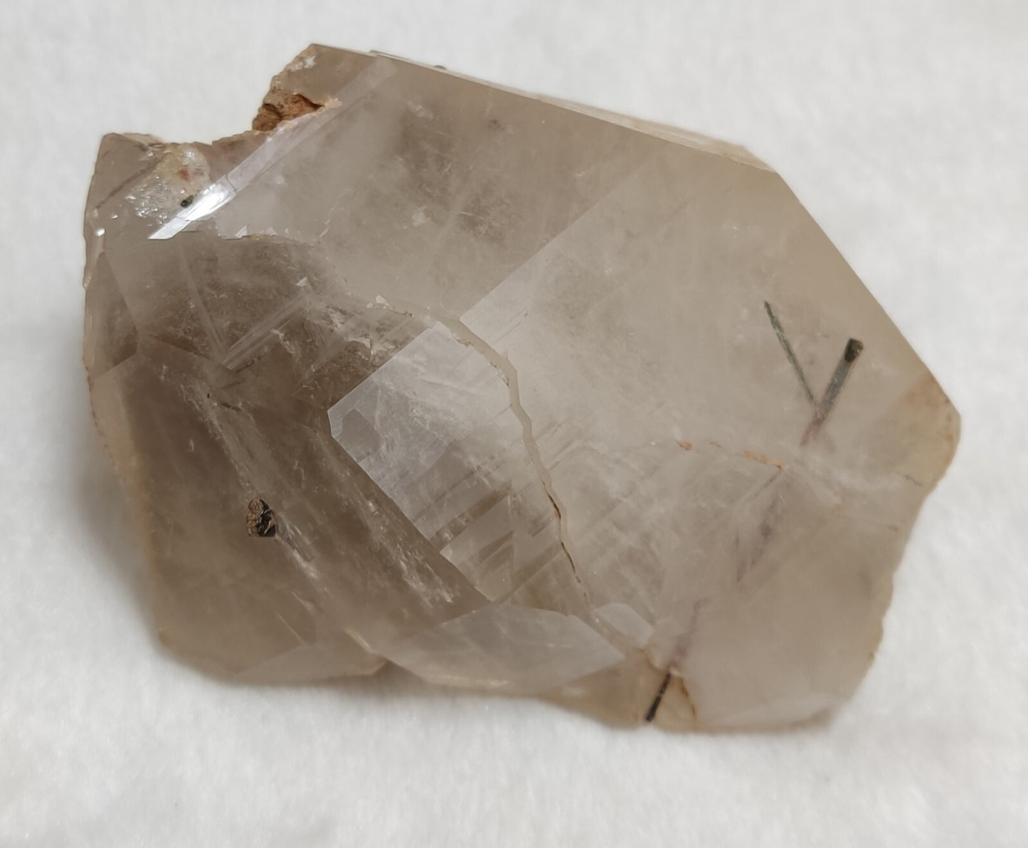 An Aesthetic terminated Quartz floater with needle inclusions 265 grams