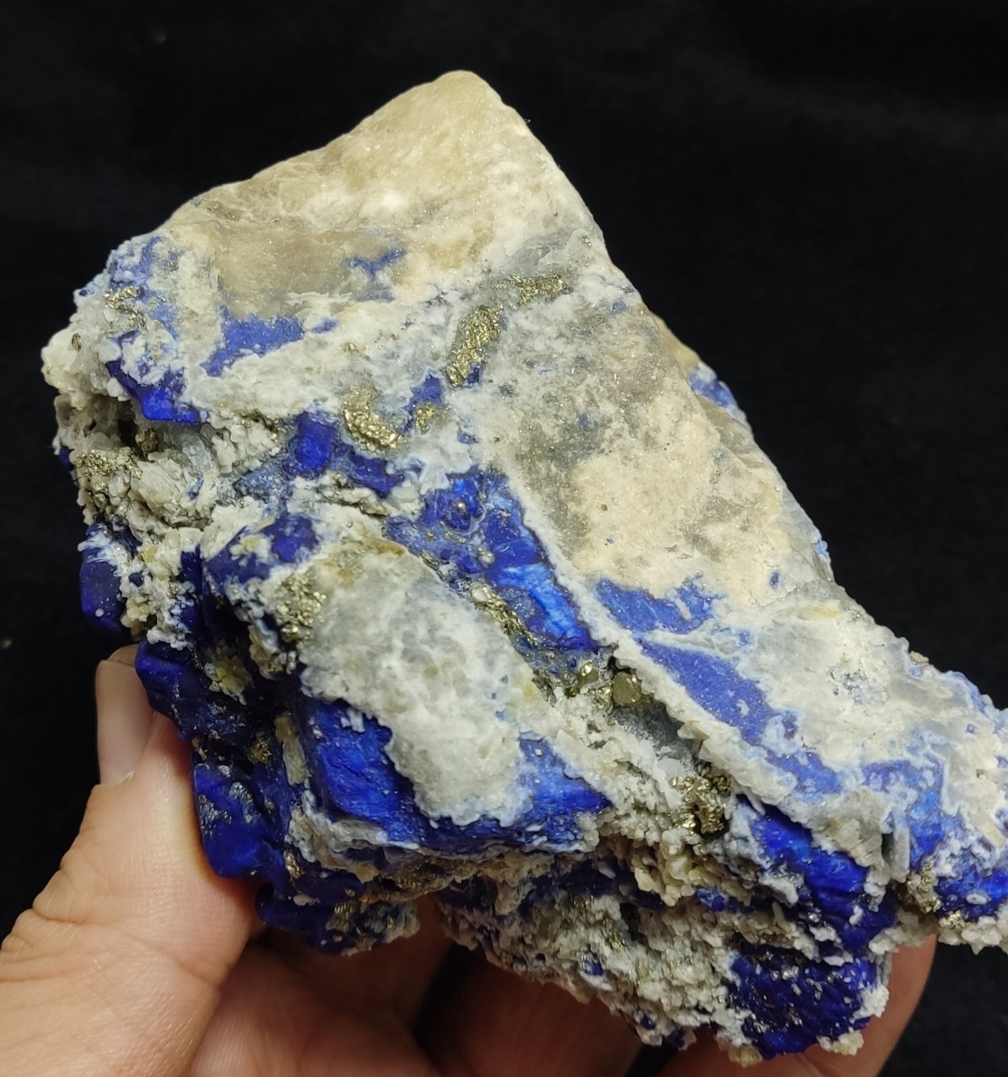 An Aesthetic specimen of fluorescent Lazurite with pyrite 489 grams