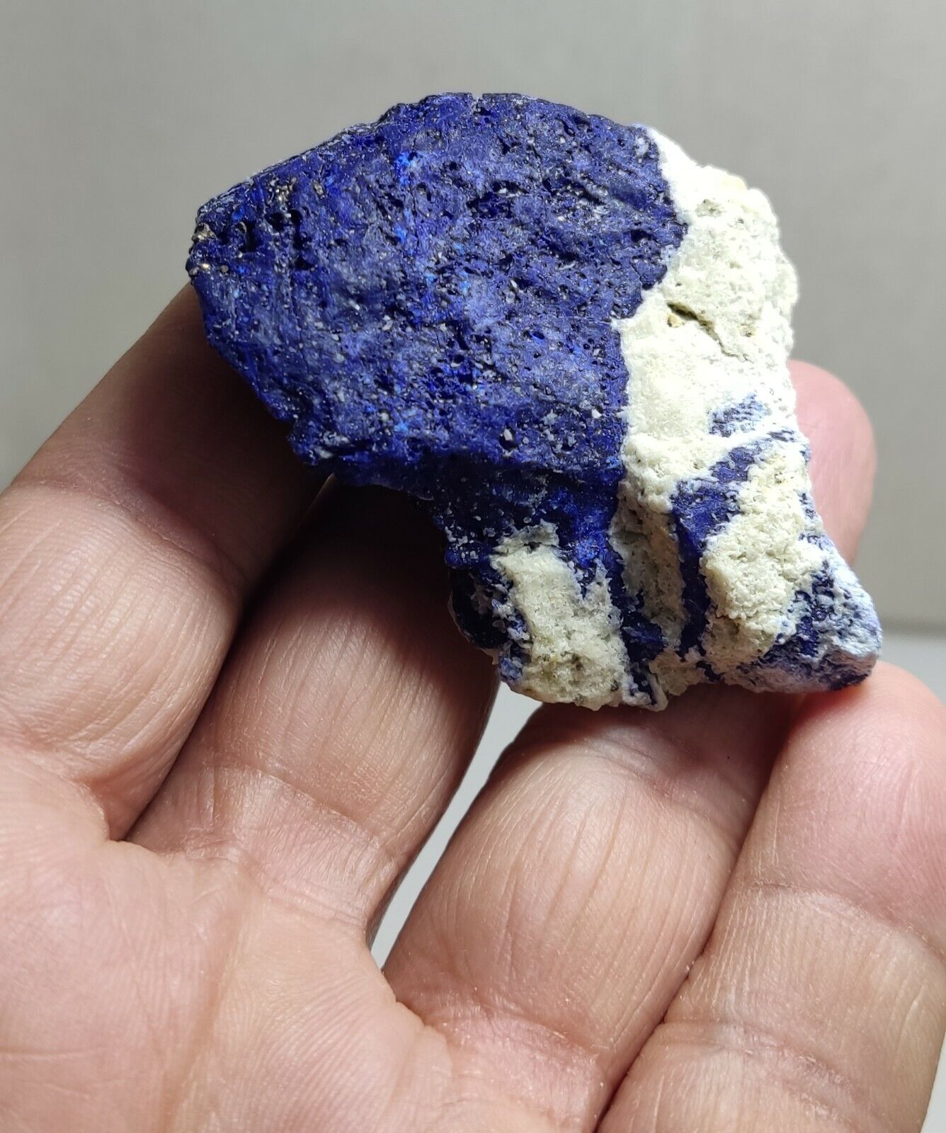 An Aesthetic specimen of fluorescent Lazurite with Pyrite 62 grams