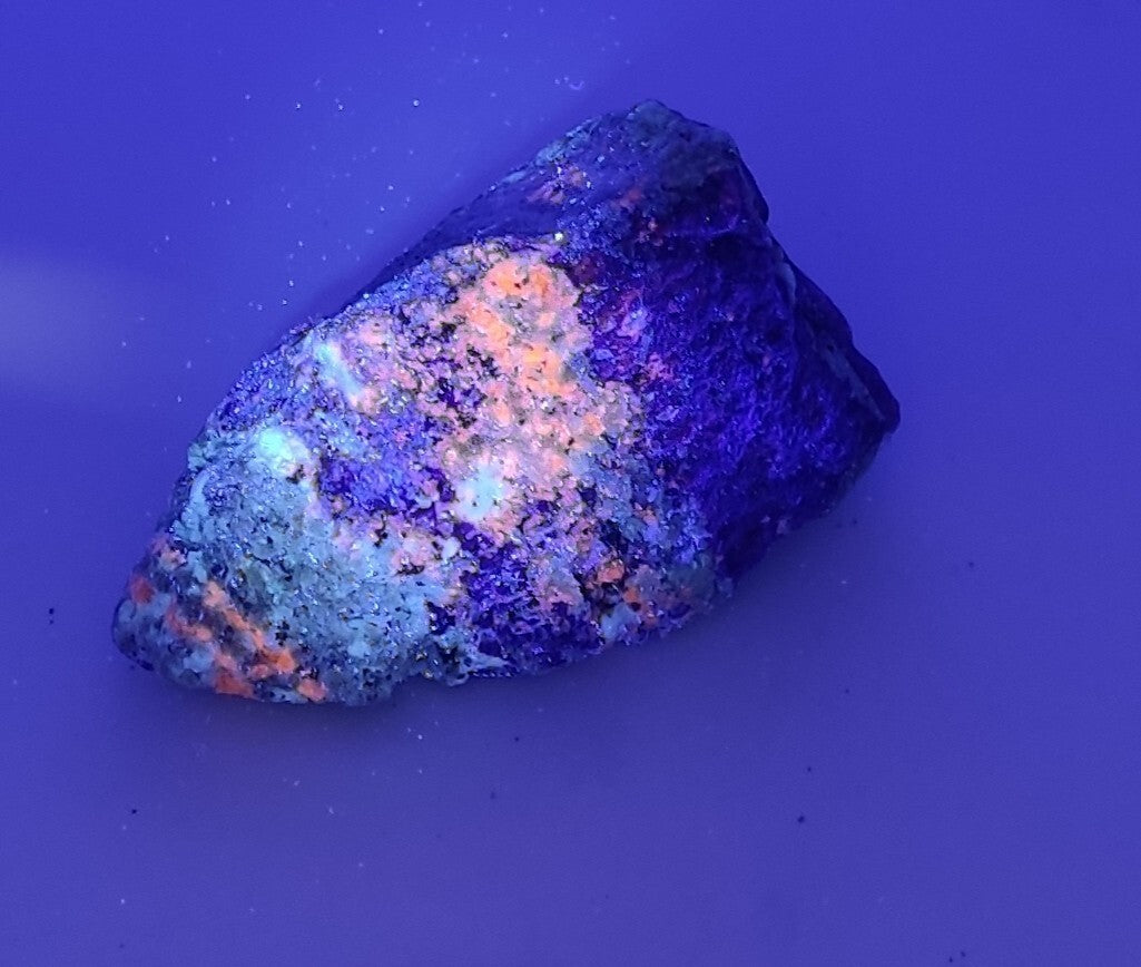 An Aesthetic specimen of fluorescent Lazurite with Pyrite 296 grams