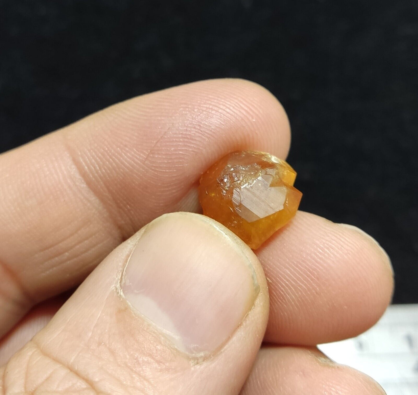 A selection of three garnet variety hessonite crystals 14.8 grams