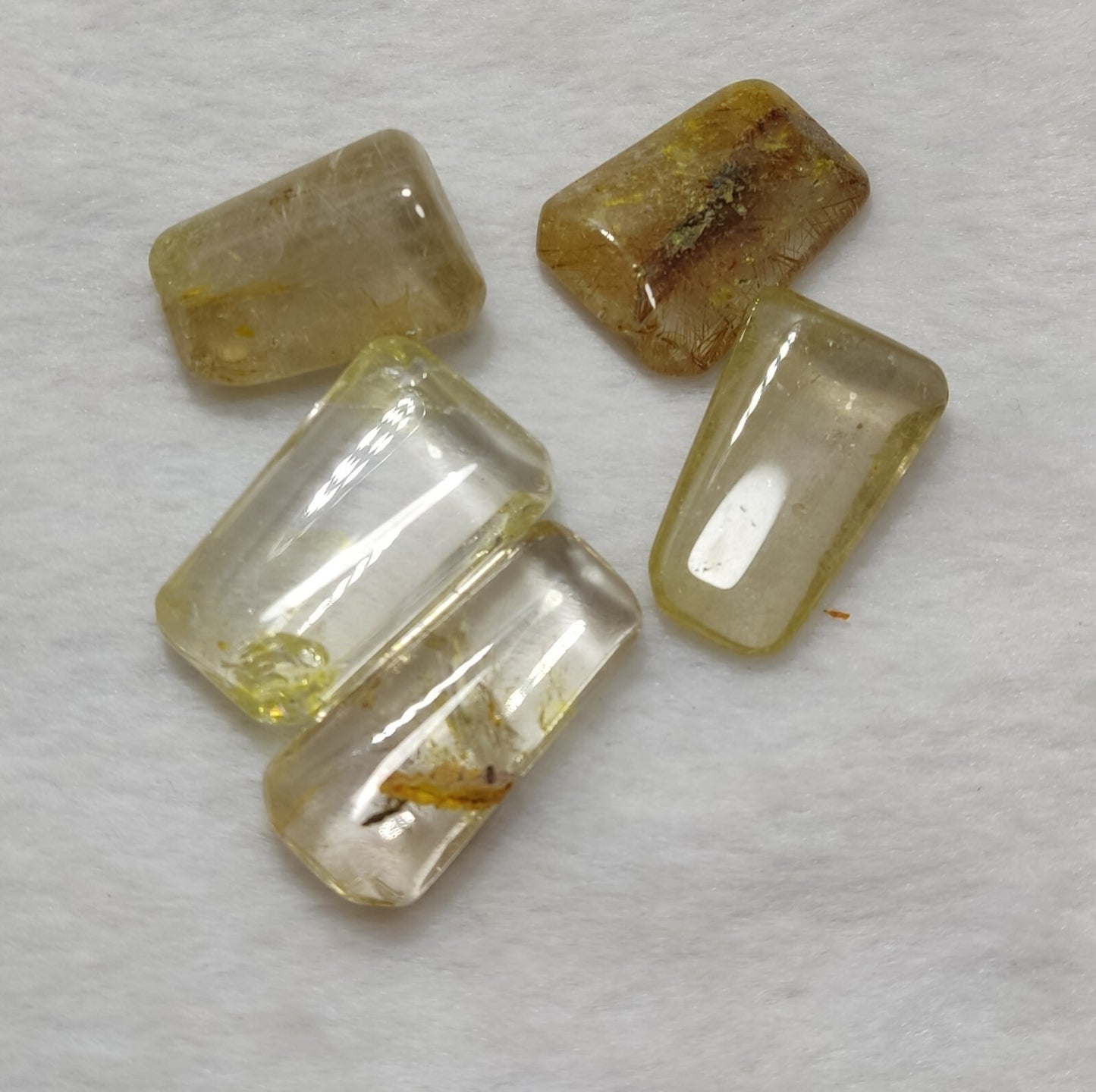 An amazing lot of Rutilated polished quartz tumbles 45 grams