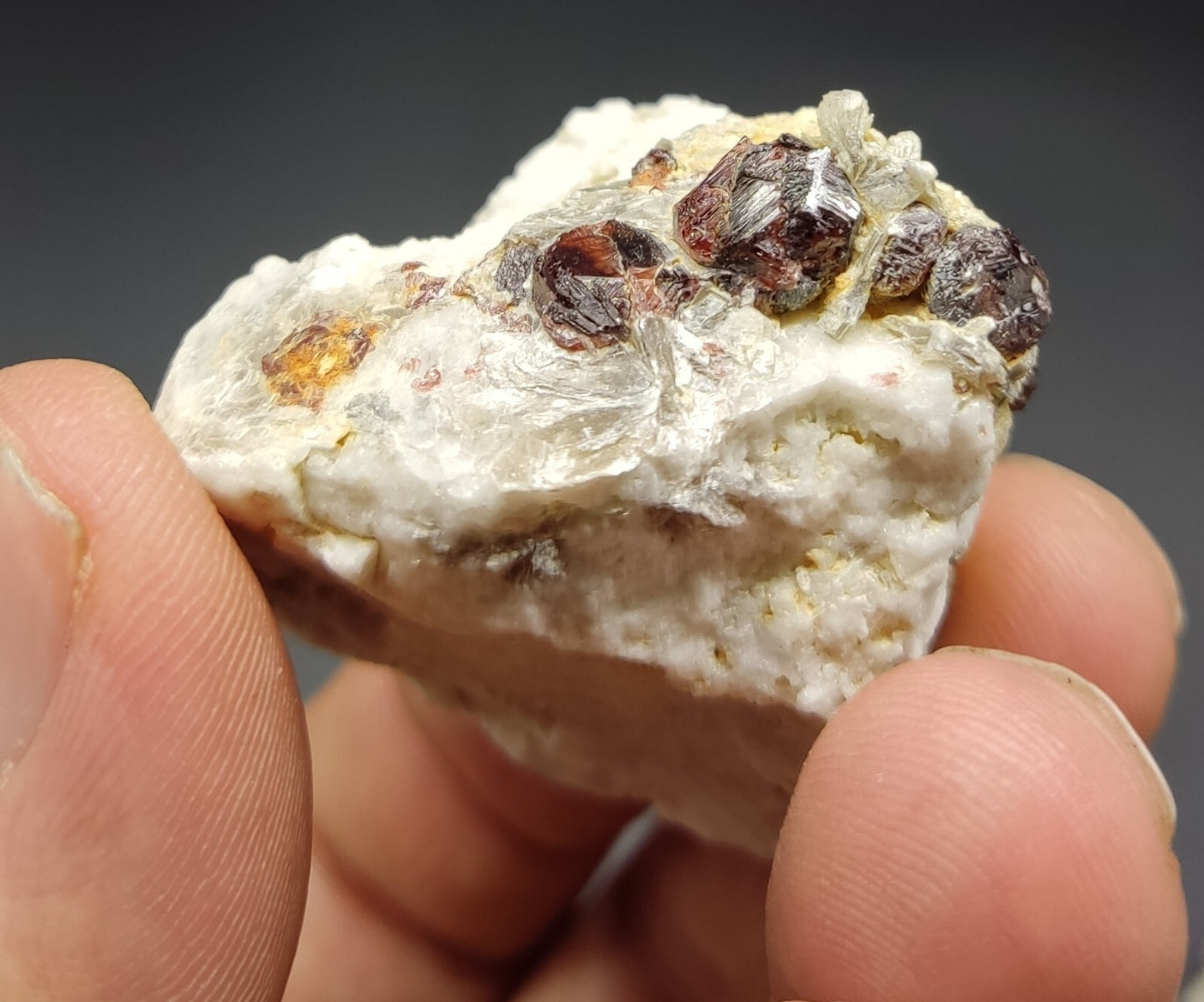An aesthetic specimen of spessartine garnets on albite/feldspar 45 grams