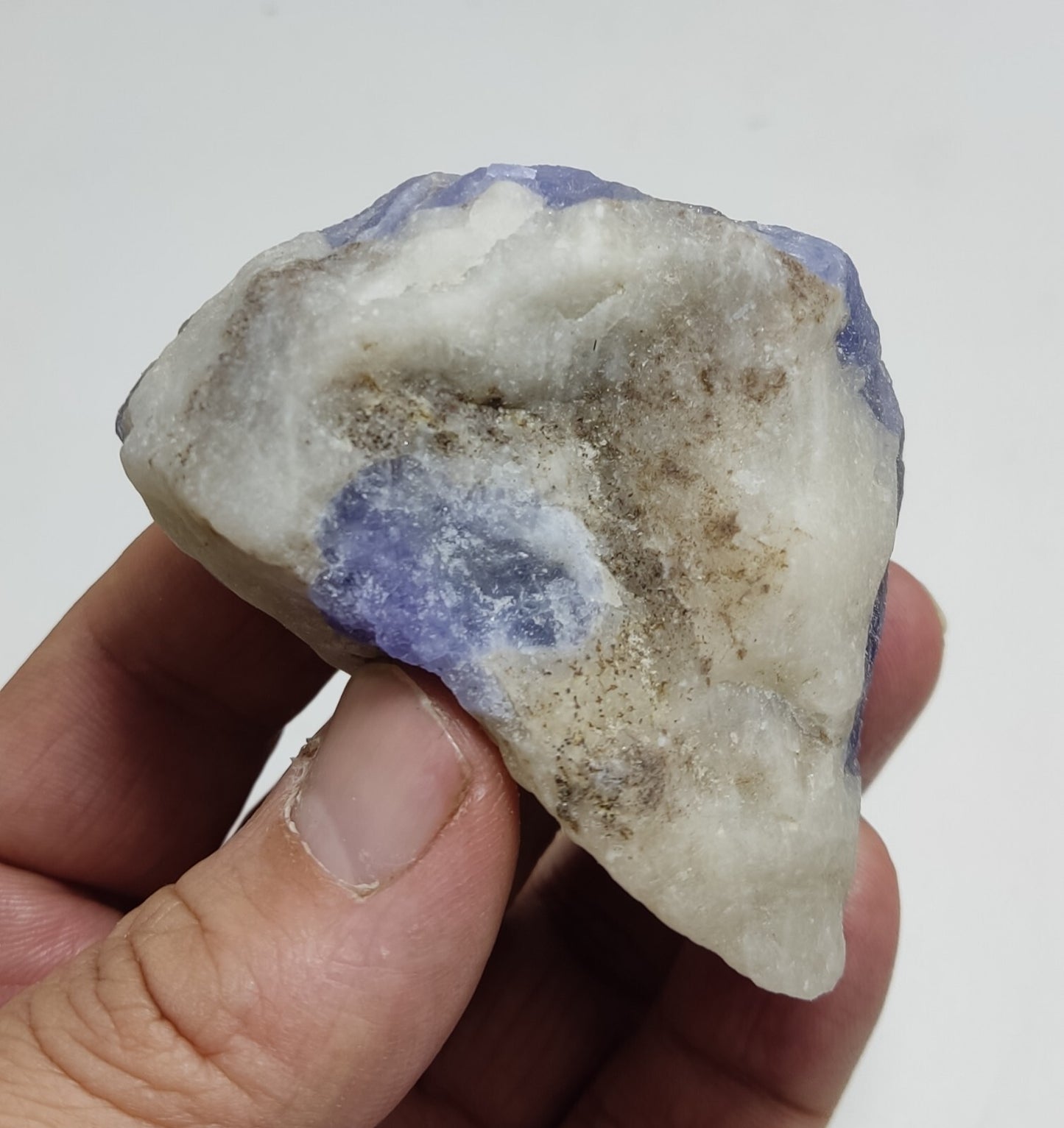 An amazing specimen of hackmanite highly Tenebrescent 124 grams