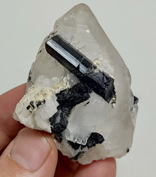 Natural quartz crystal with black tourmaline 129 grams