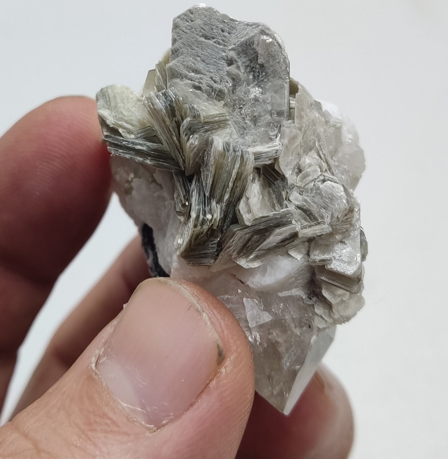 An Aesthetic specimen of muscovite with quartz, Tourmaline and albite 49 grams