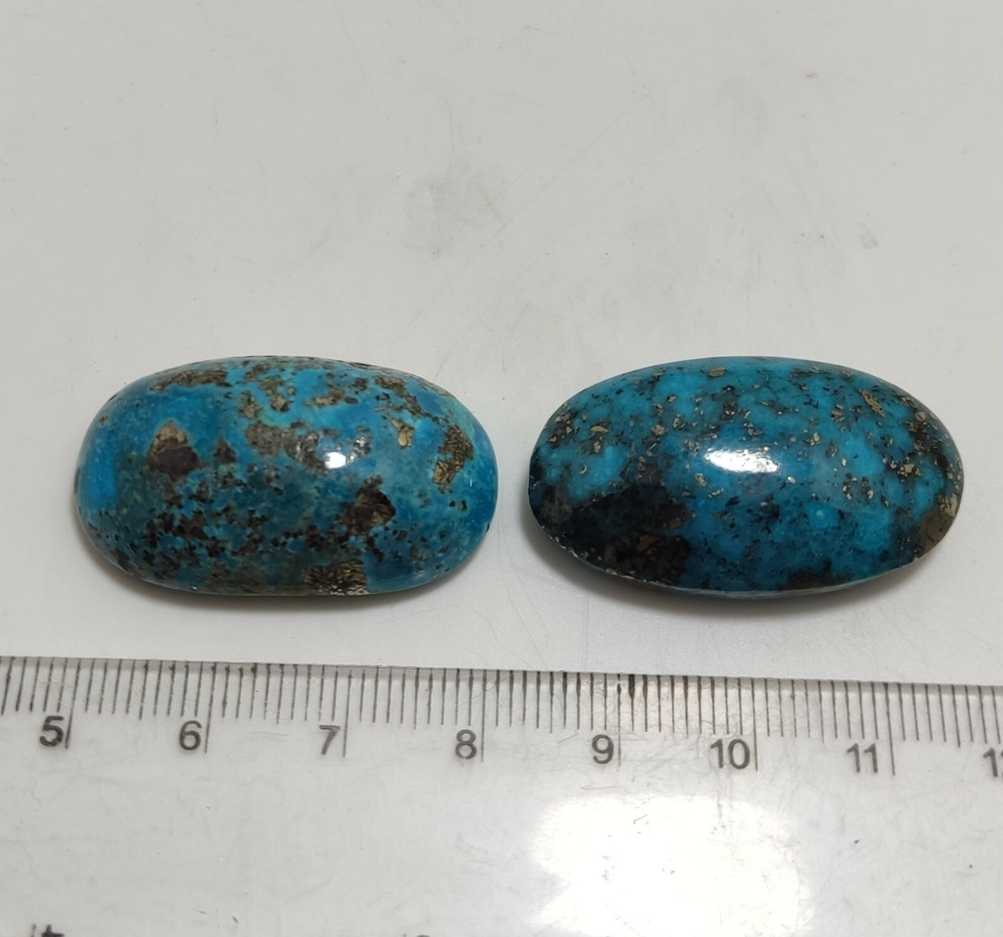 Two turquoise cabochons 22.5 grams both