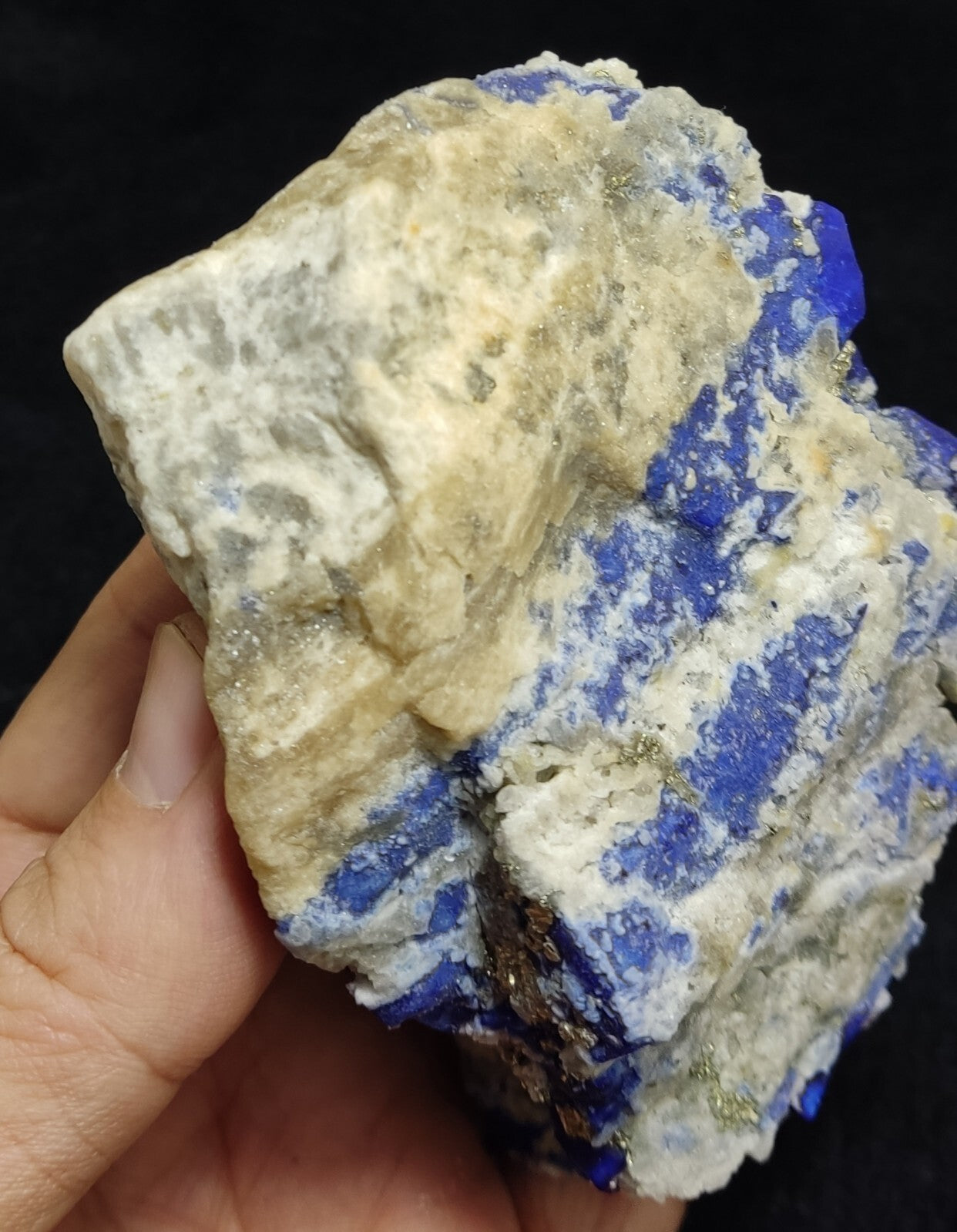 An Aesthetic specimen of fluorescent Lazurite with pyrite 489 grams