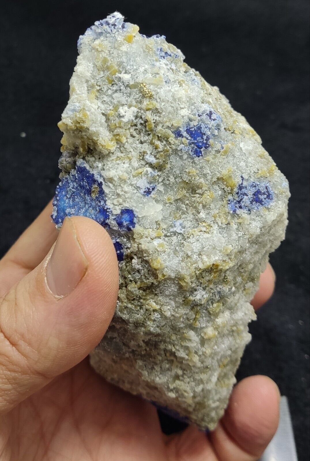 An Aesthetic specimen of fluorescent Lazurite with pyrite 415 grams