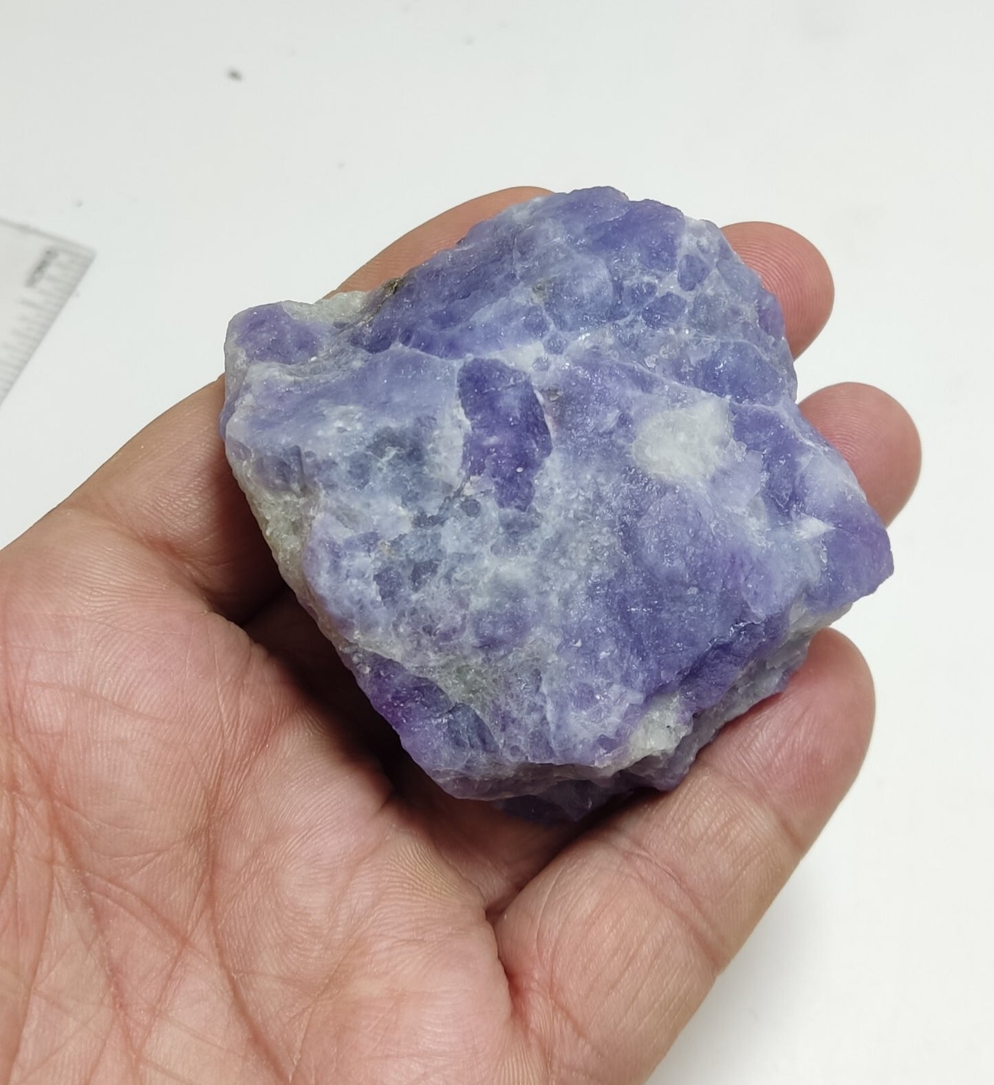 An amazing specimen of hackmanite highly Tenebrescent 143 grams