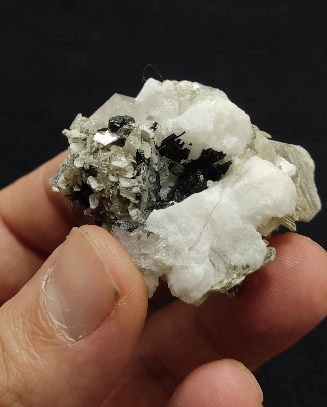 An Aesthetic specimen of muscovite with quartz, Tourmaline and albite 49 grams