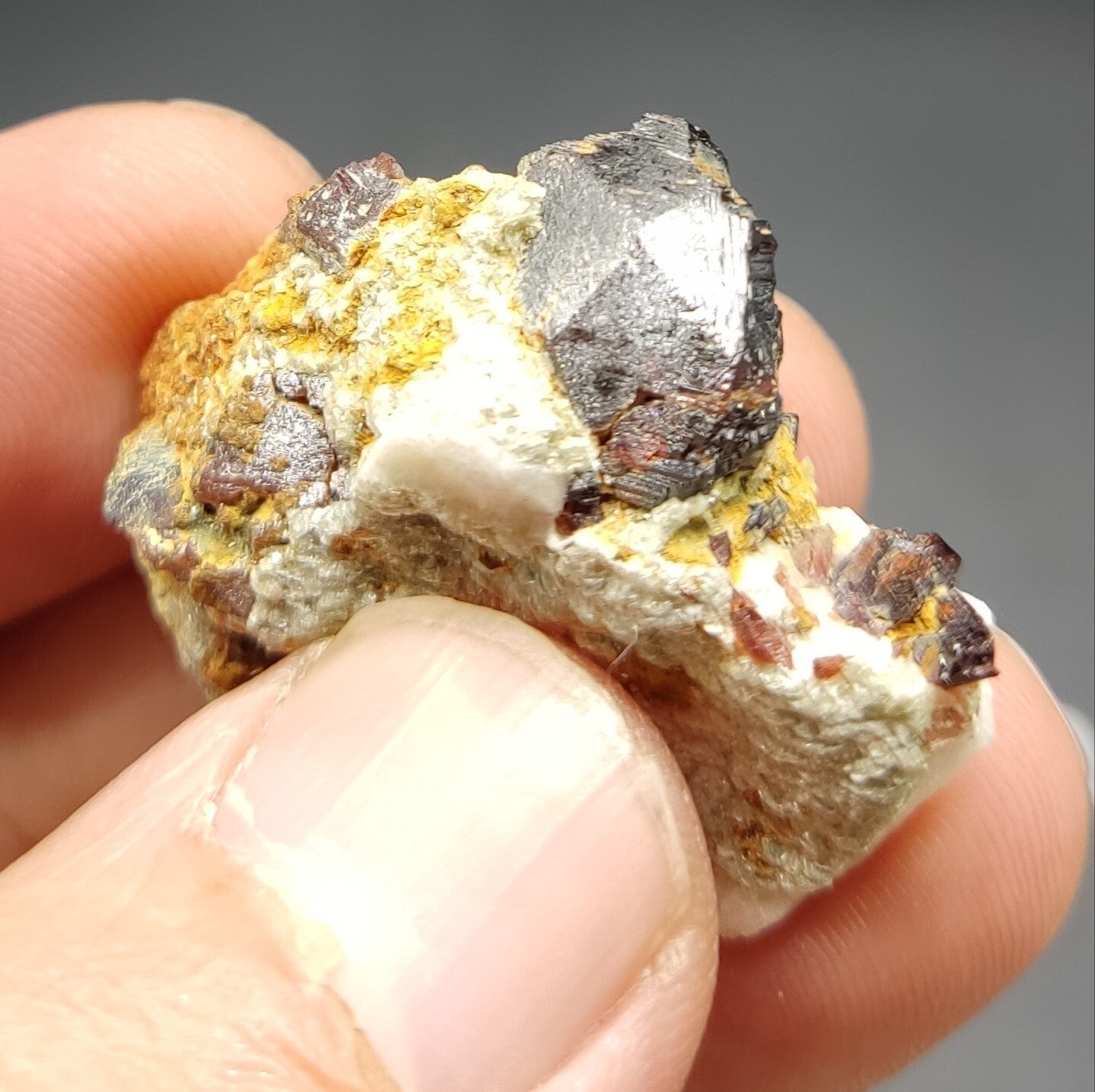 An aesthetic specimen of spessartine garnets on albite/feldspar 15 grams