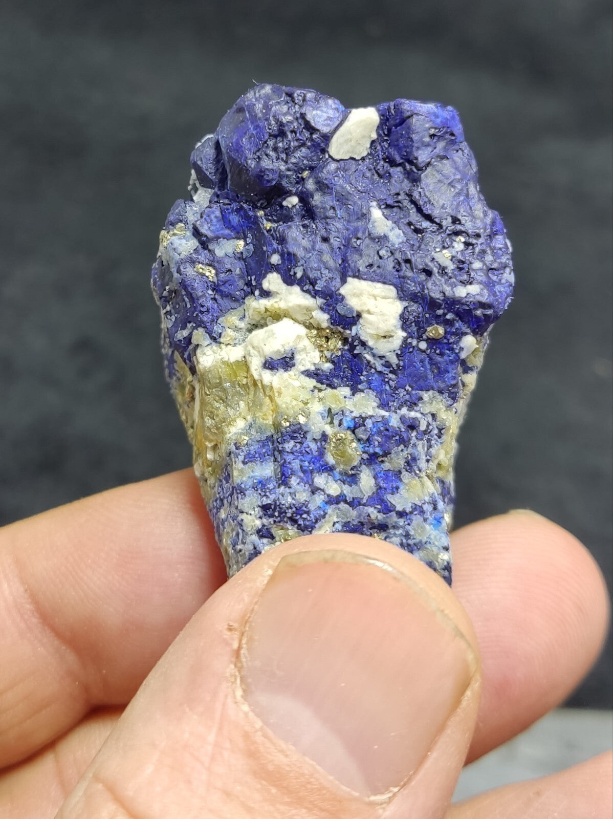 An Aesthetic specimen of fluorescent Lazurite with pyrite 65 grams