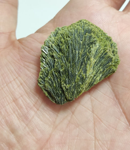 An aesthetic specimen of epidote crystal spray type 22 grams