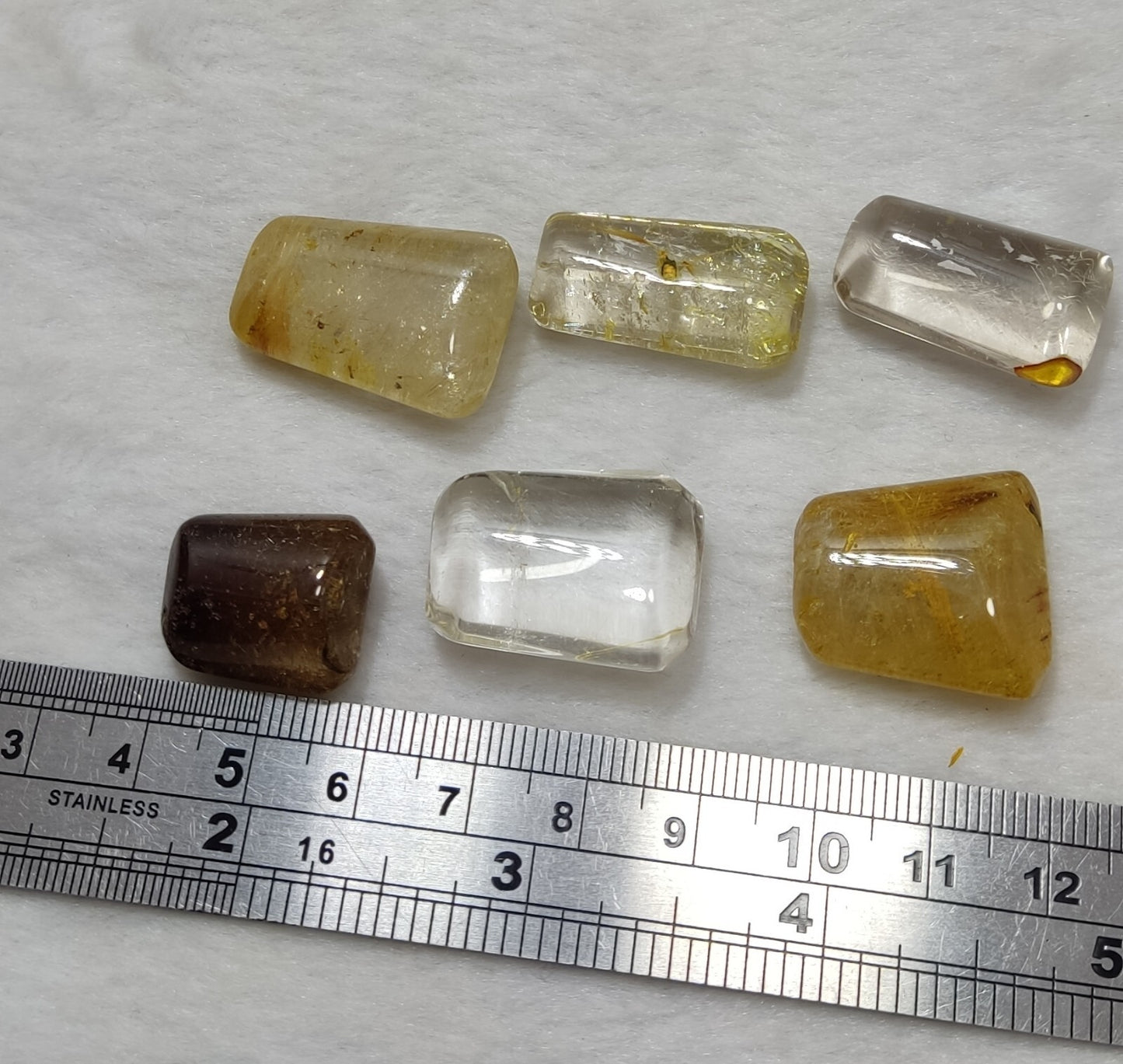 An amazing lot of Rutilated polished quartz tumbles 44 grams
