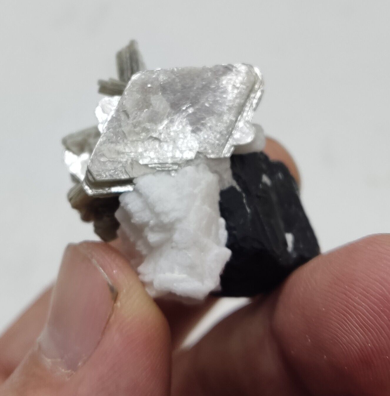 An Aesthetic specimen of muscovite with Tourmaline and albite 26 grams