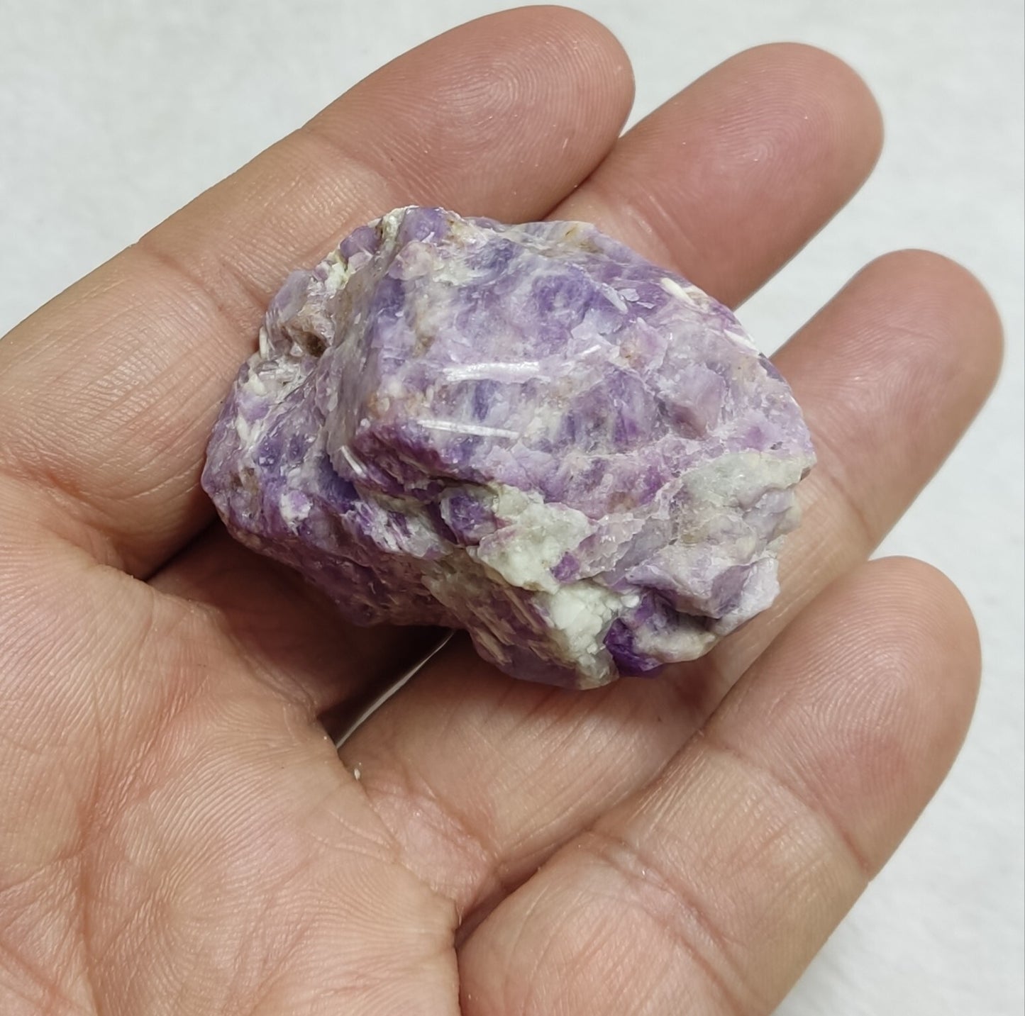 An amazing specimen of fluorescent rough hackmanite chunk 51 grams