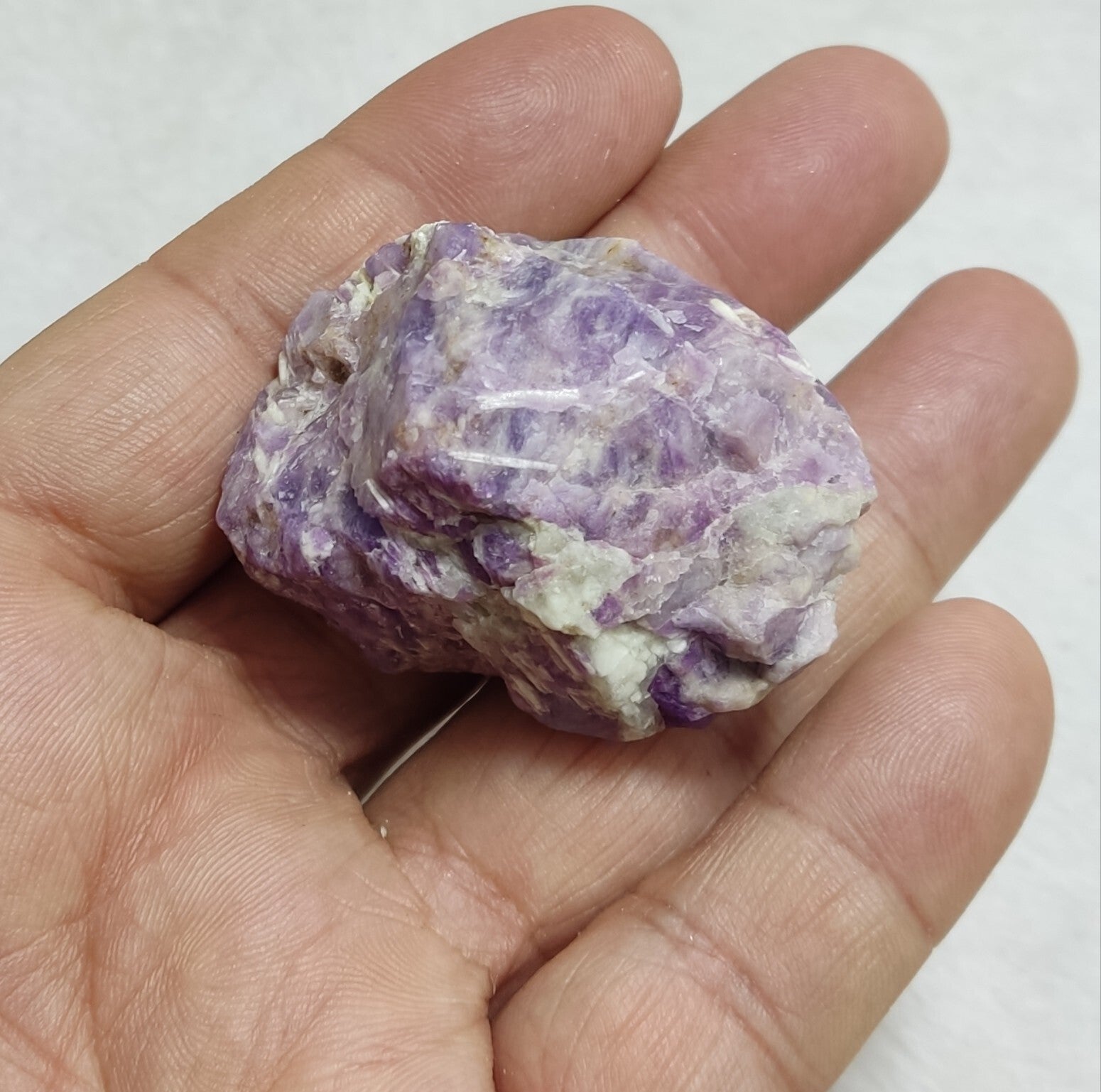 An amazing specimen of fluorescent rough hackmanite chunk 51 grams