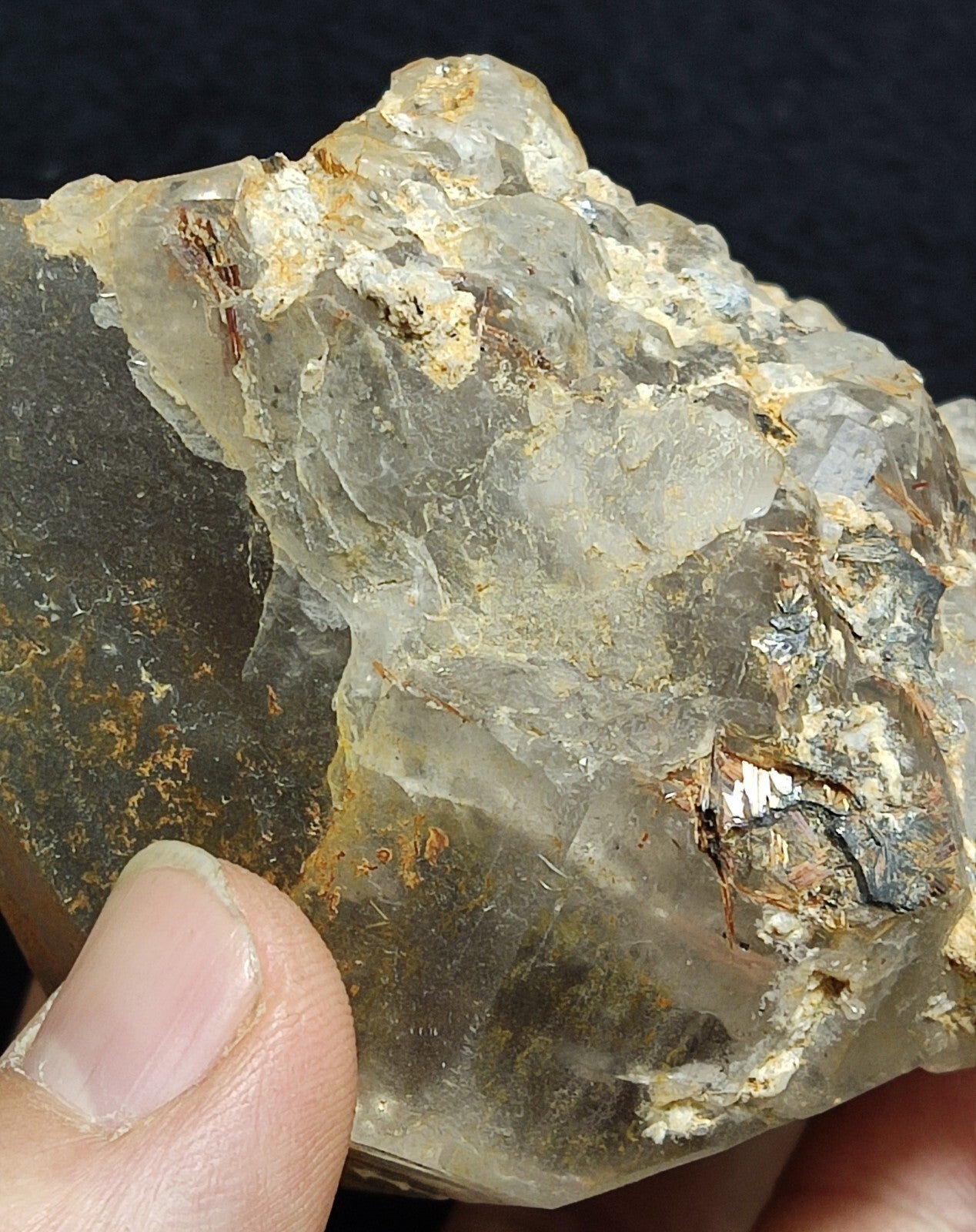 An Aesthetic terminated Quartz floater with rutiles and hematite 399 grams