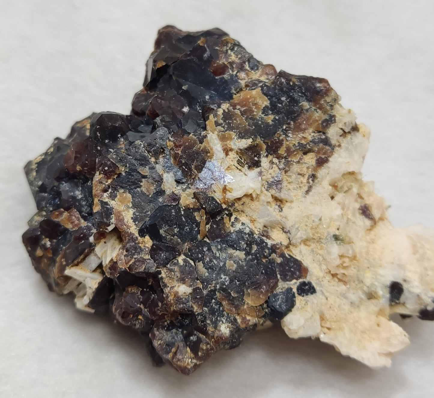An Aesthetic specimen of andradite garnets on matrix 120 grams