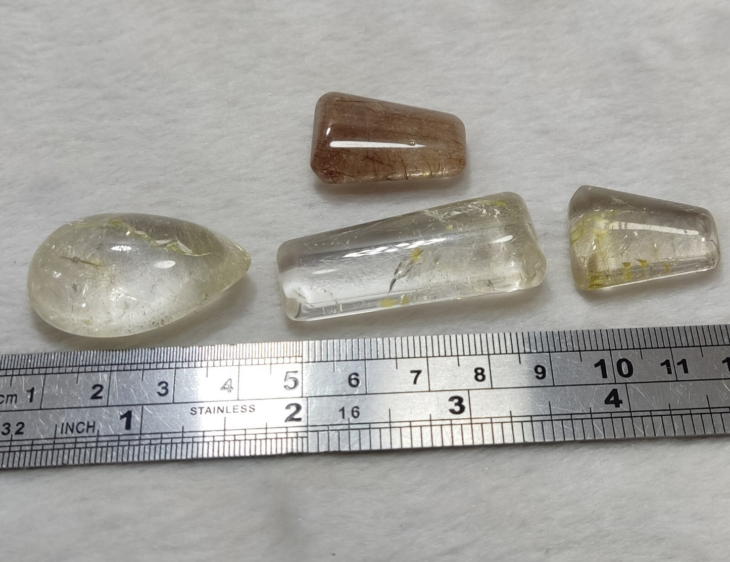 An amazing lot of Rutilated polished quartz tumbles 51 grams