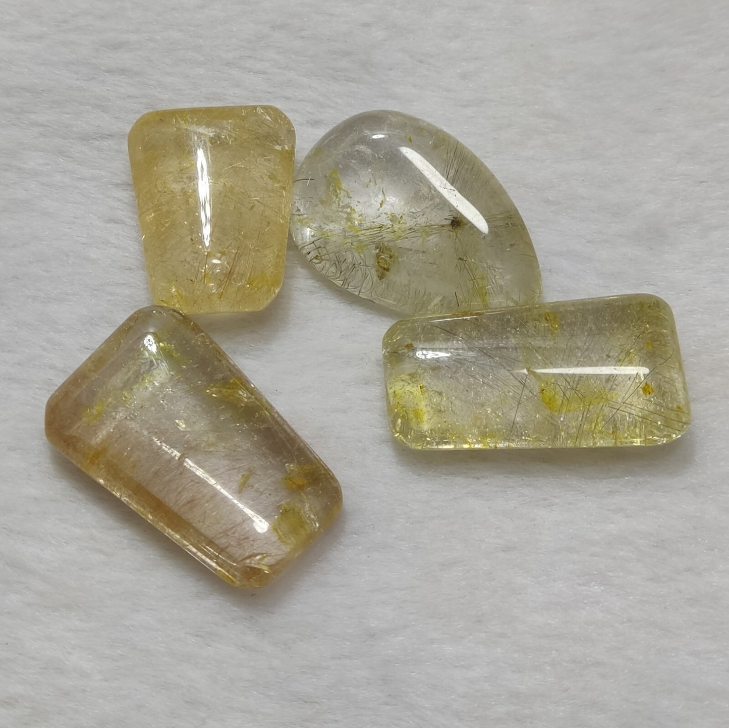 An amazing lot of Rutilated polished quartz tumbles 45 grams