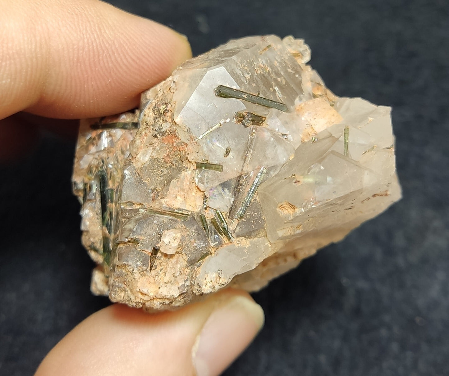 An Aesthetic terminated Quartz floater with aegirine inclusions 98 grams
