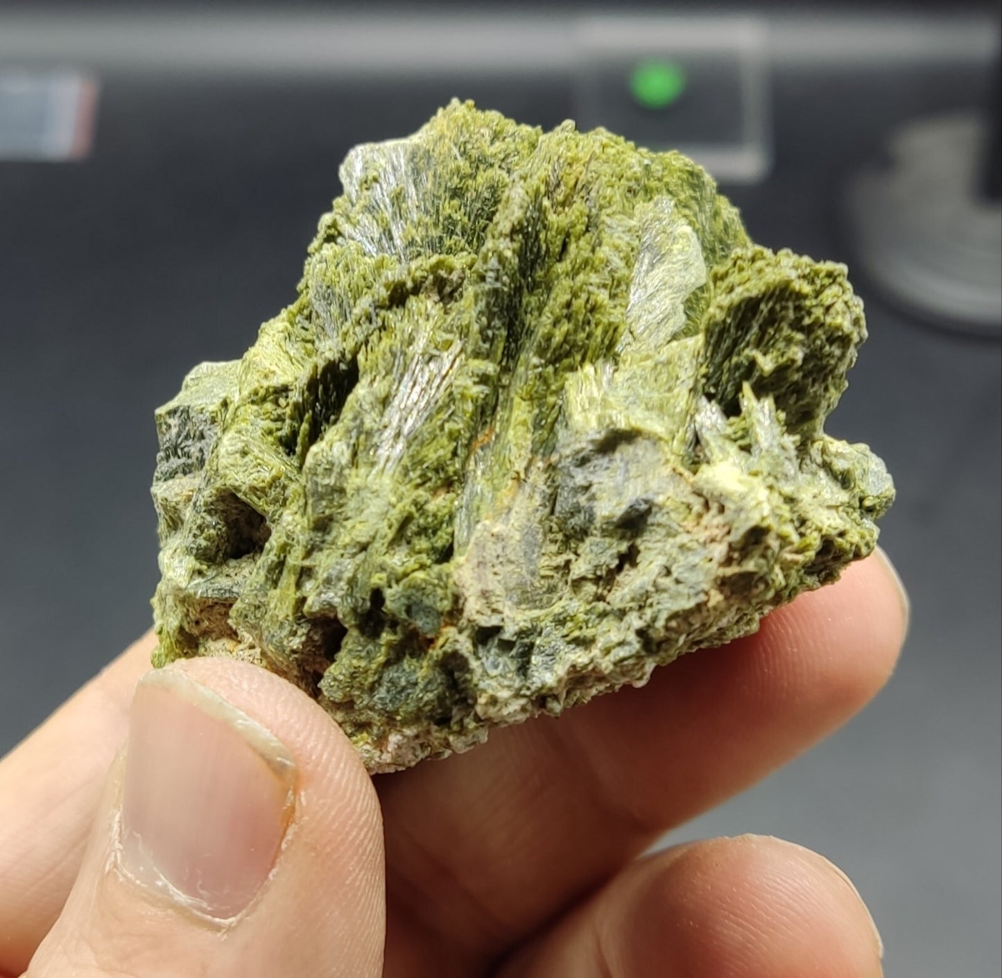 An aesthetic specimen of epidote crystal spray type 107 grams