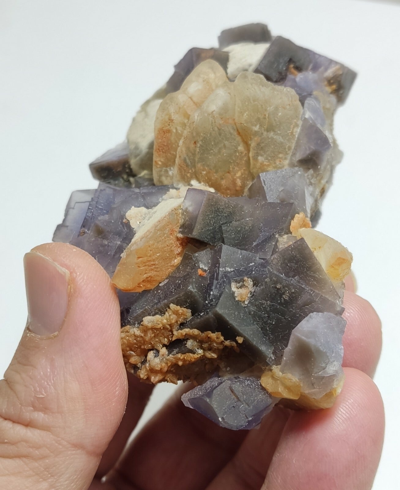 An amazing specimen of cubic purplish color Fluorite with calcite 263 grams
