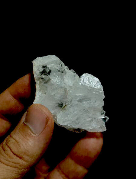 Natural quartz Clusters With Brookite Inclusions . Black Color Brookites .