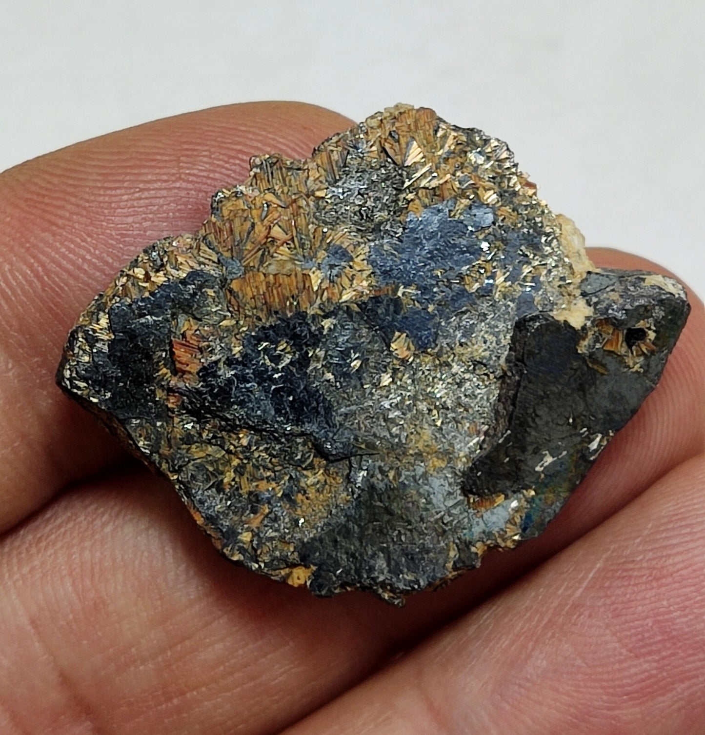 12 grams hematite specimen with rutiles saginite inclusions