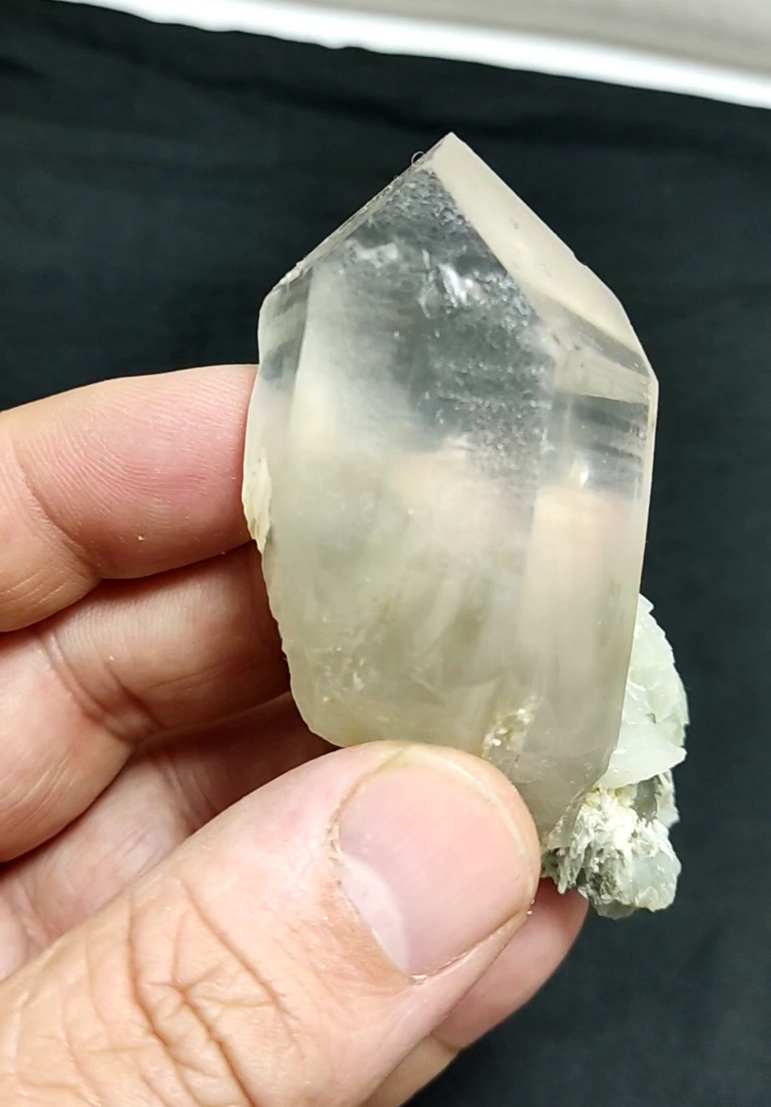 An amazing specimen of terminated Quartz crystal with unique inclusions 97 grams
