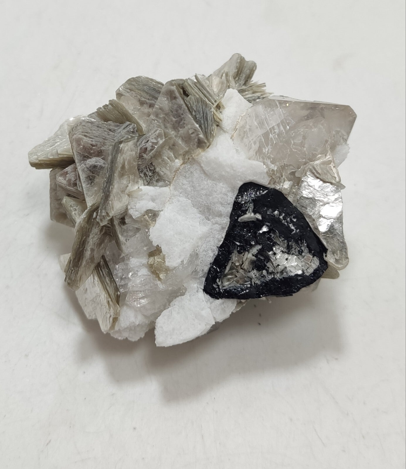 An Aesthetic specimen of muscovite with quartz, Tourmaline and albite 49 grams