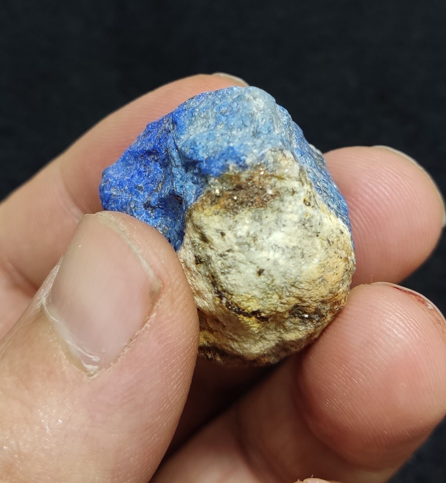 An Aesthetic specimen of fluorescent lapis/lazurite on matrix 23 grams