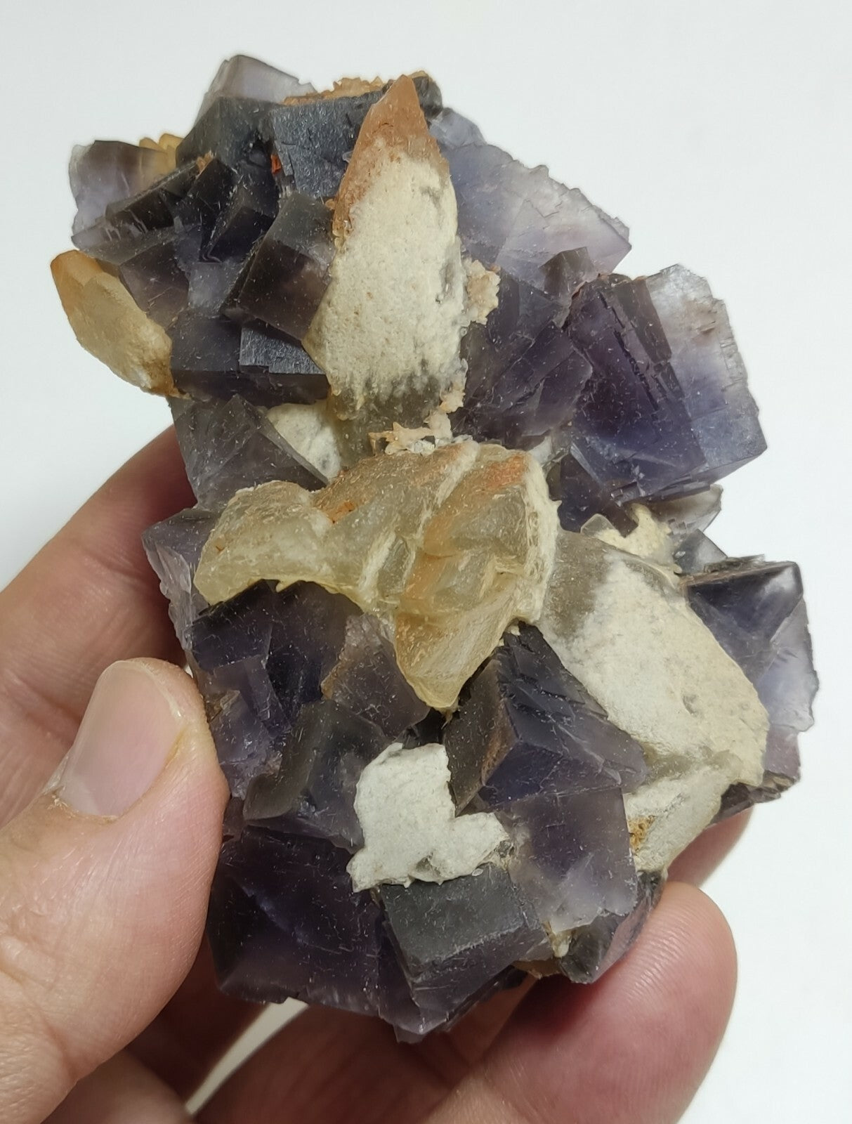 An amazing specimen of cubic purplish color Fluorite with calcite 263 grams