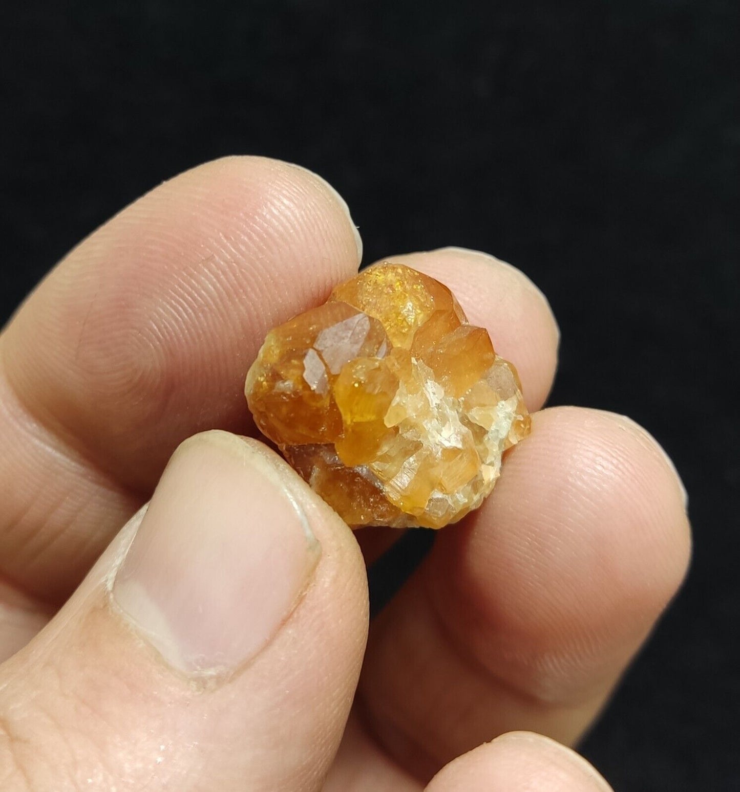 A selection of three garnet variety hessonite crystals 14.8 grams