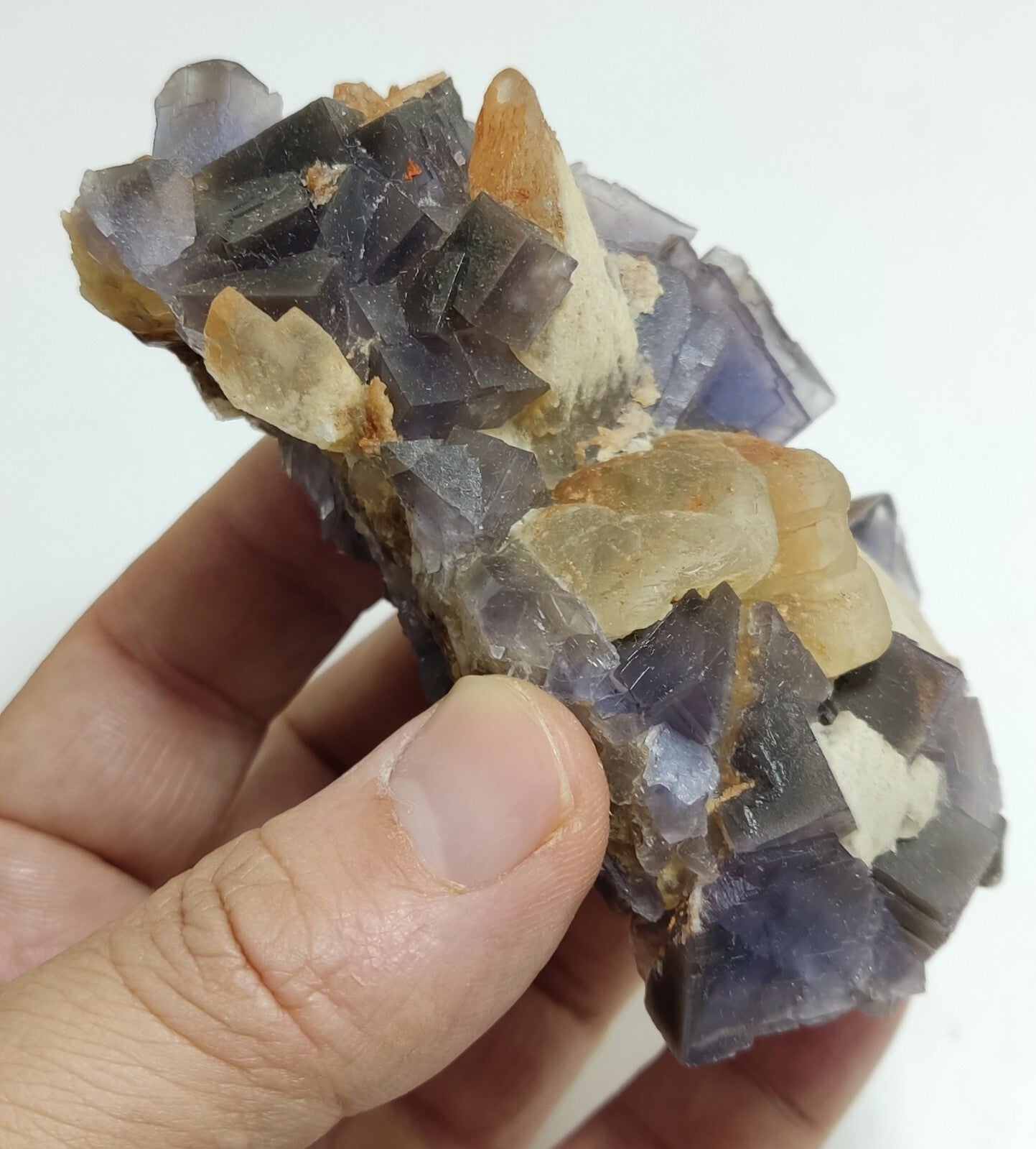 An amazing specimen of cubic purplish color Fluorite with calcite 263 grams